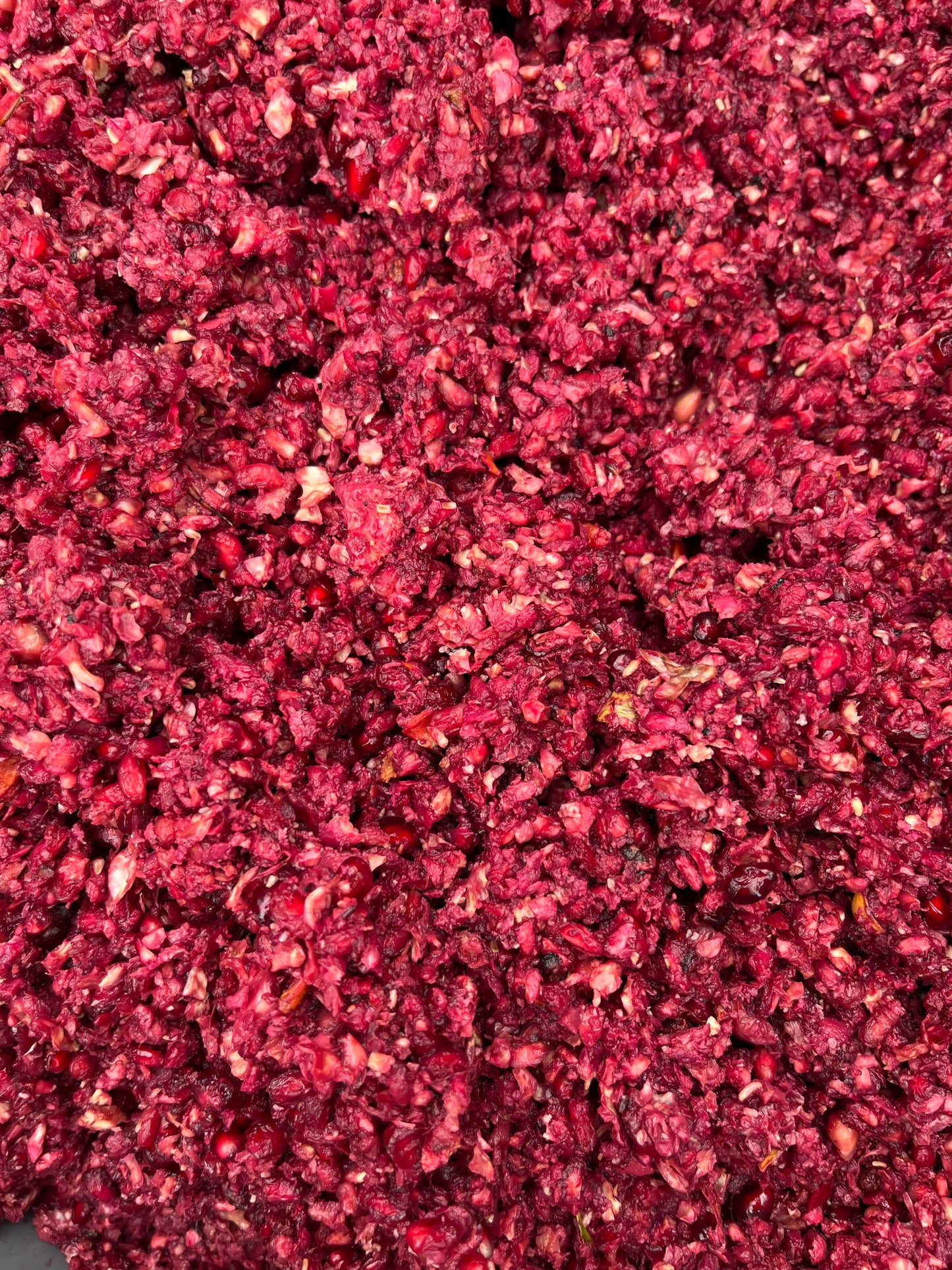 Close-up of red crushed pomegranate