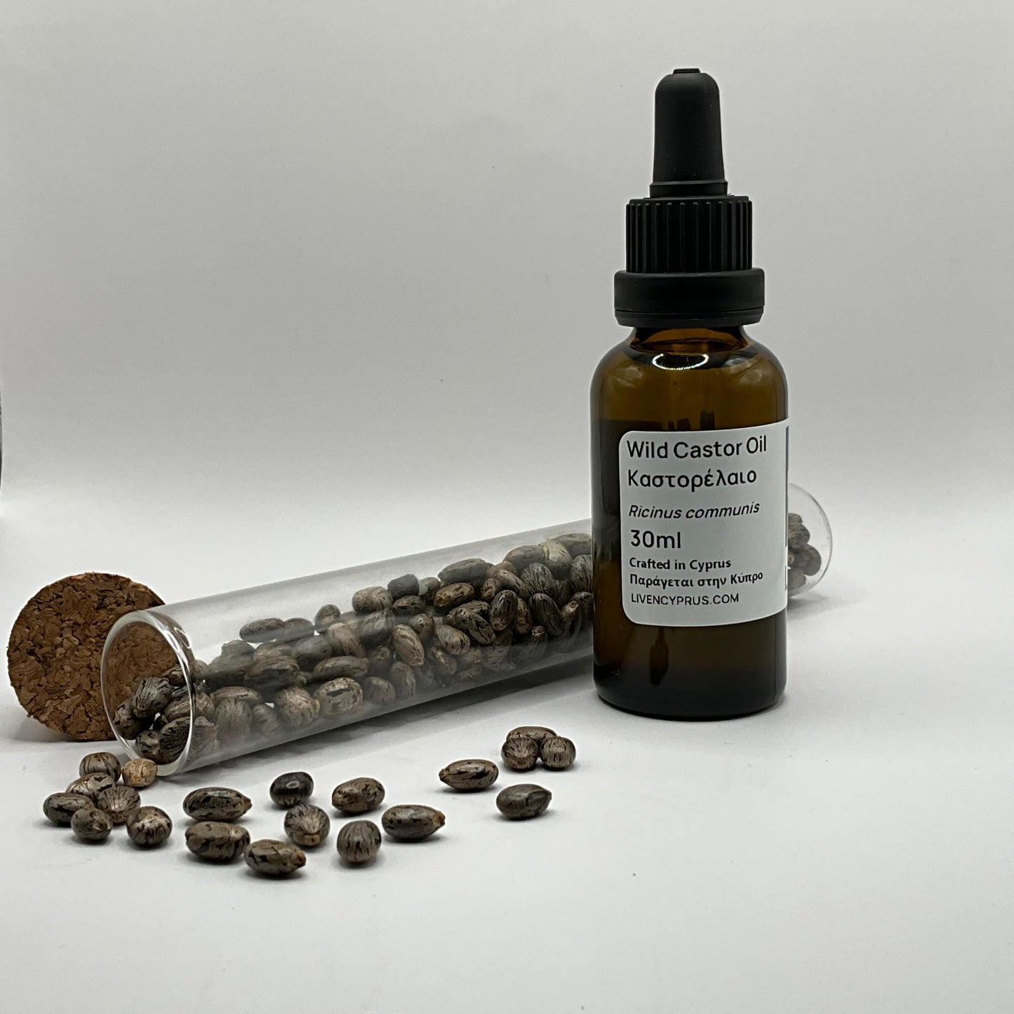 Bottle of Wild Castor Oil with castor beans hexane free