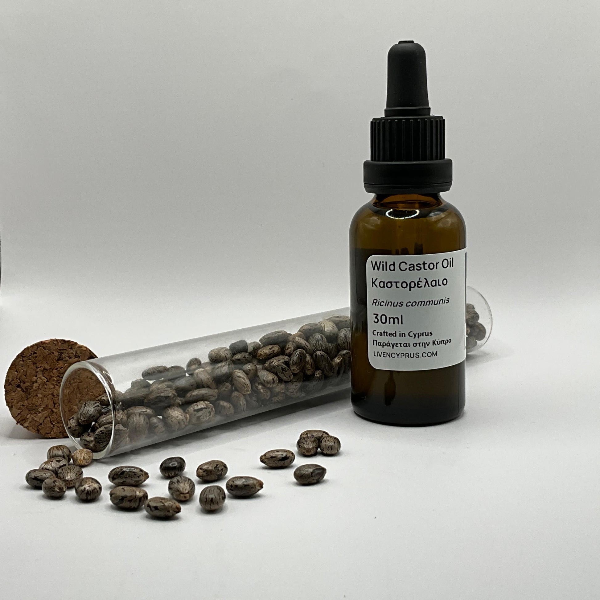 Bottle of Wild Castor Oil with castor beans hexane free