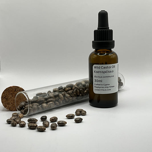 Bottle of Wild Castor Oil with castor beans hexane free