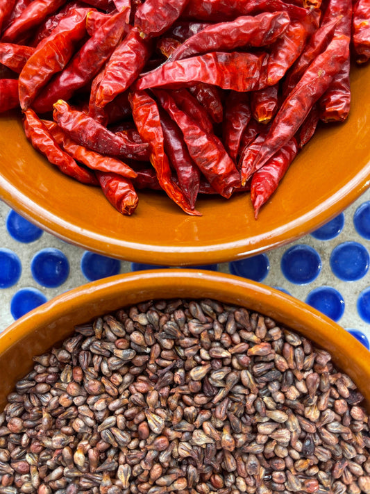 Chili and grapeseed ready to be cold-pressed