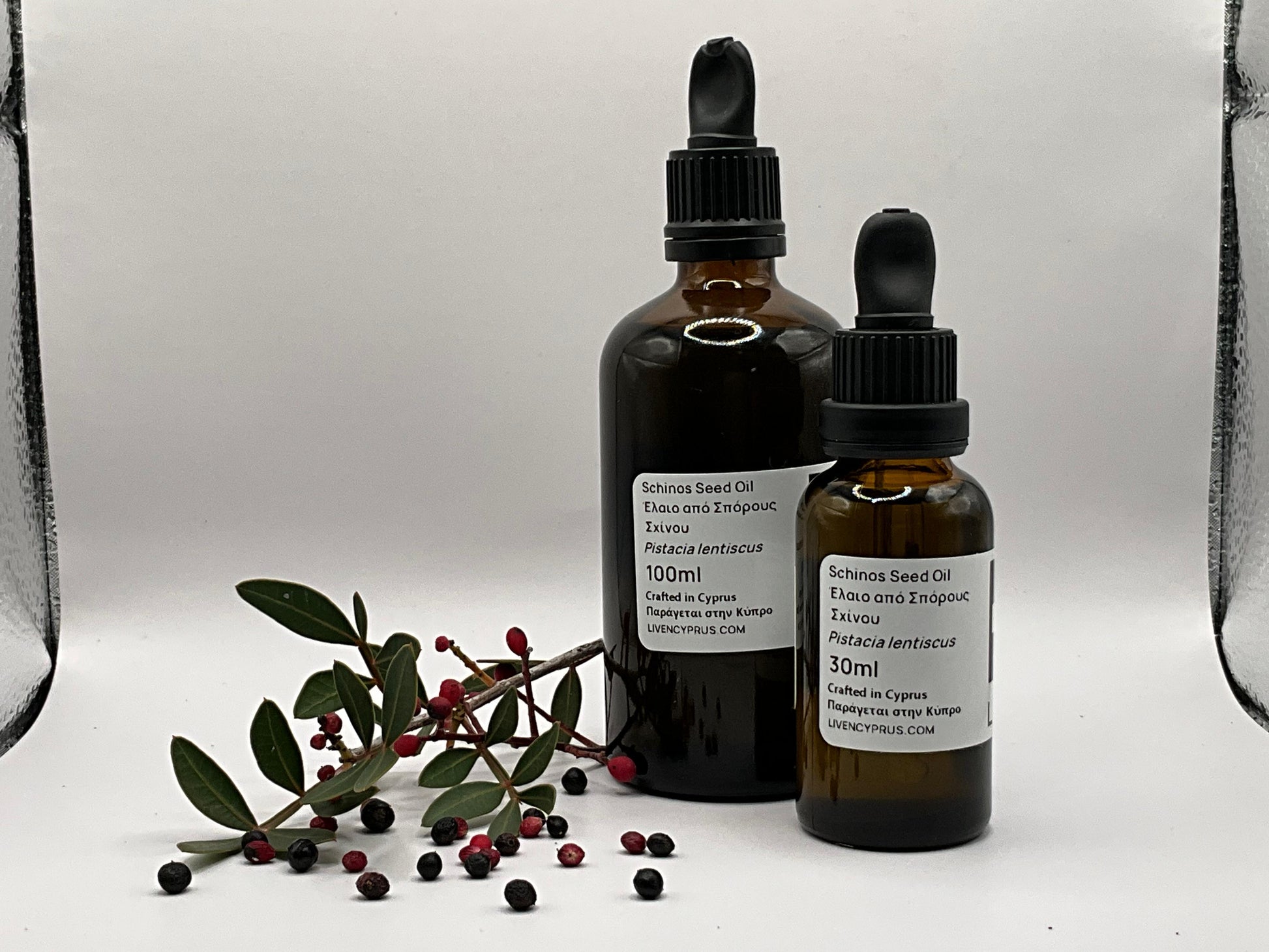 Two glass dropper bottles with cyprus mastic berry Schinos lentisk Oil