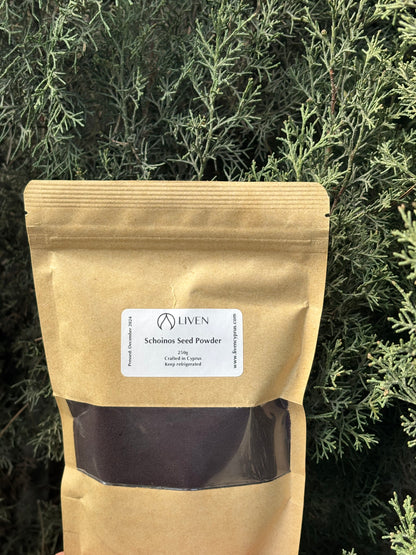 A packaged product labeled as 'Schinos Seed Powder' mastic berry.