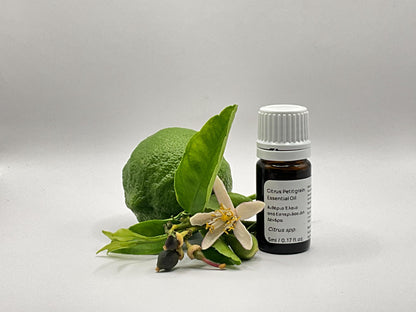Bottle of petitgrain essential oil with  lemon flower