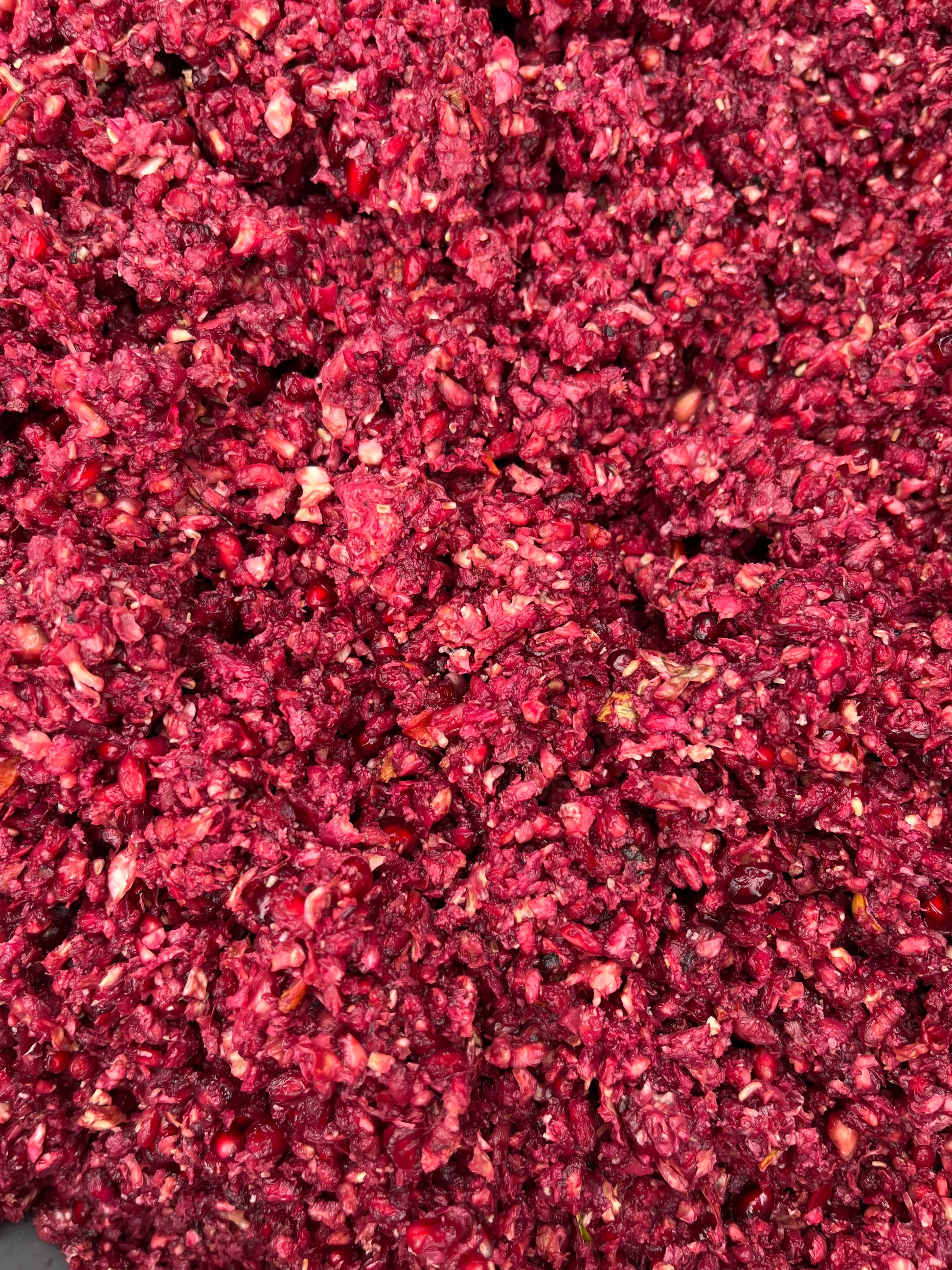Close-up of red crushed pomegranate